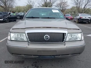 2003 Mercury Grand Marquis LS Premium z VIN 2MEFM75W73X653224, wystawiony jako IAAI lot #42038256 z przebiegiem 145 374 mil mil oraz . Historia ofert i sprzedaży dostępna na DreamBid. Obrazek 12.