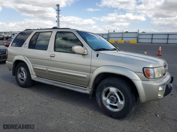 1999 Infiniti QX4 Luxury with VIN JNRAR07Y6XW070437, listed as a Copart auction lot 70798154 with 148,298 mi miles and Salvage Title. Bid and sale history available at carsss.com. Image 4.