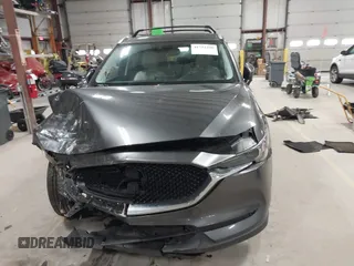 2020 Mazda CX-5 Grand Touring with VIN JM3KFBDM3L0739763, listed as a IAAI auction lot 41751250 with 88,063 mi miles and . Bid and sale history available at carsss.com. Image 12.
