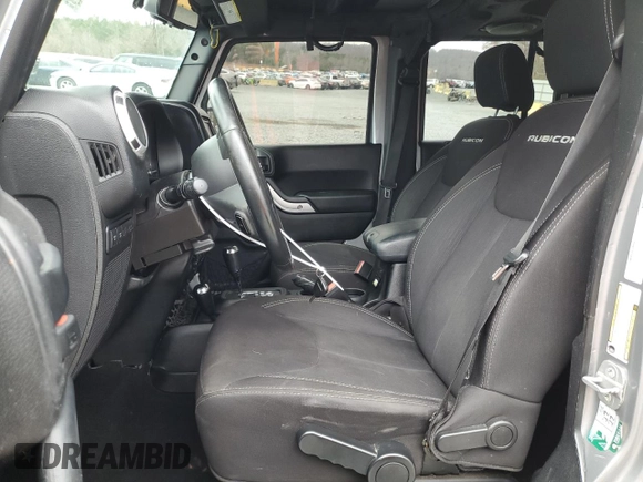 2014 Jeep Wrangler Unlimited Rubicon with VIN 1C4BJWFG7EL197252, listed as a Copart auction lot 44798205 with 115,778 mi miles and Salvage Title. Bid and sale history available at carsss.com. Image 7.