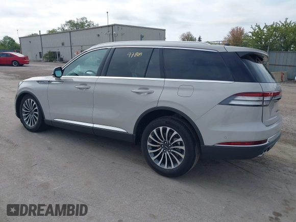 2023 Lincoln Aviator Reserve z VIN 5LM5J7WC0PGL29563, wystawiony jako IAAI lot #42219788 z przebiegiem 4 861 mil mil oraz . Historia ofert i sprzedaży dostępna na DreamBid. Obrazek 3.