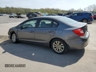 2012 Honda Civic EX with VIN 2HGFB2F83CH311453, listed as a Copart auction lot 55051765 with 242,944 mi miles and Salvage Title. Bid and sale history available at DreamBid. Image 2.