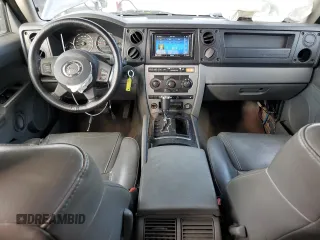 2006 Jeep Commander with VIN 1J8HH48N46C133122, listed as a Copart auction lot 80821094 with 216,412 mi miles and Salvage Title. Bid and sale history available at carsss.com. Image 8.