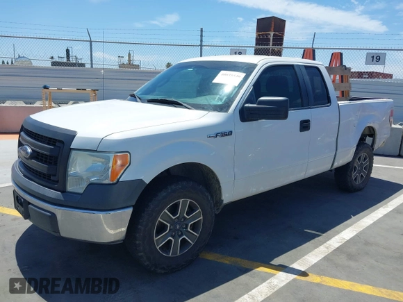 2014 Ford F-150 XL with VIN 1FTEX1CMXEFD13082, listed as a IAAI auction lot 40035539 with 204,751 mi miles and . Bid and sale history available at DreamBid. Image 18.