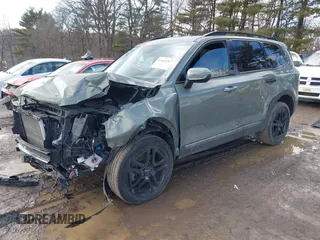 2023 Kia Telluride EX X-Line z VIN 5XYP3DGC8PG338845, wystawiony jako IAAI lot #41665367 z przebiegiem 63 595 mil mil oraz . Historia ofert i sprzedaży dostępna na DreamBid. Obrazek 2.