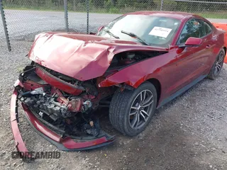 2016 Ford Mustang EcoBoost z VIN 1FA6P8TH4G5266159, wystawiony jako IAAI lot #41930934 z przebiegiem 158 794 mil mil oraz . Historia ofert i sprzedaży dostępna na DreamBid. Obrazek 18.