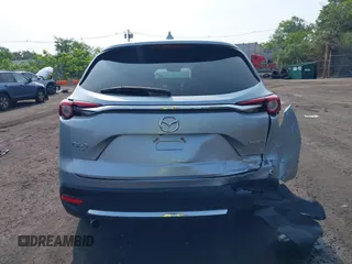 2020 Mazda CX-9 Grand Touring with VIN JM3TCBDY6L0424584, listed as a IAAI auction lot 42473920 with 32,385 mi miles and . Bid and sale history available at DreamBid. Image 16.
