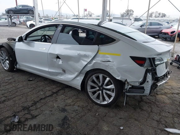 2020 Tesla Model 3 Long Range with VIN 5YJ3E1EB5LF801530, listed as a IAAI auction lot 41682050 with 65,743 mi miles. Bid and sale history available at carsss.com. Image 3.