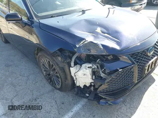 2021 Toyota Avalon Hybrid XSE z VIN 4T1EA1AB3MU005275, wystawiony jako IAAI lot #42335546 z przebiegiem 46 524 mil mil oraz . Historia ofert i sprzedaży dostępna na DreamBid. Obrazek 6.
