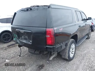 2016 Chevrolet Suburban LT with VIN 1GNSKHKCXGR478707, listed as a IAAI auction lot 41183747 with 157,893 mi miles. Bid and sale history available at carsss.com. Image 4.