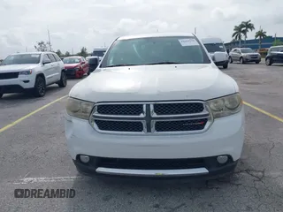 2013 Dodge Durango SXT with VIN 1C4RDHAG1DC669503, listed as a IAAI auction lot 42614210 with 103,482 mi miles and . Bid and sale history available at DreamBid. Image 12.