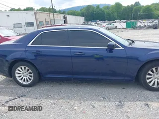 2014 Chrysler 300 z VIN 2C3CCAAG5EH373645, wystawiony jako IAAI lot #42282963 z przebiegiem 220 825 mil mil oraz . Historia ofert i sprzedaży dostępna na DreamBid. Obrazek 13.