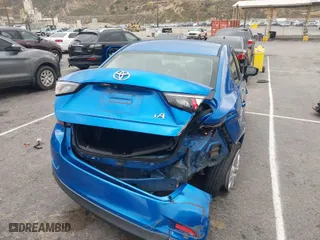 2018 Toyota Yaris iA with VIN 3MYDLBYV5JY313199, listed as a IAAI auction lot 41773993 with 69,034 mi miles. Bid and sale history available at carsss.com. Image 4.