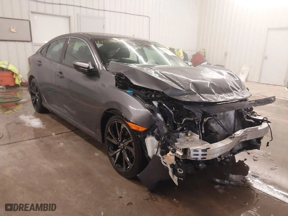 2019 Honda Civic Sedan Sport with VIN 2HGFC2F88KH556681, listed as a IAAI auction lot 41585019 with 92,349 mi miles. Bid and sale history available at carsss.com. Image 1.