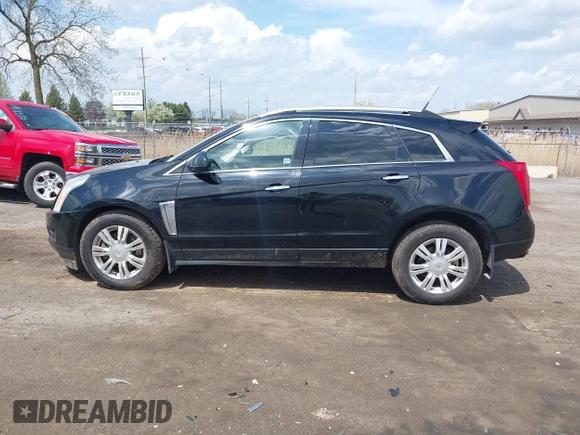 2014 Cadillac SRX Luxury Collection z VIN 3GYFNEE32ES659705, wystawiony jako IAAI lot #42148269 z przebiegiem 140 560 mil mil oraz . Historia ofert i sprzedaży dostępna na DreamBid. Obrazek 14.
