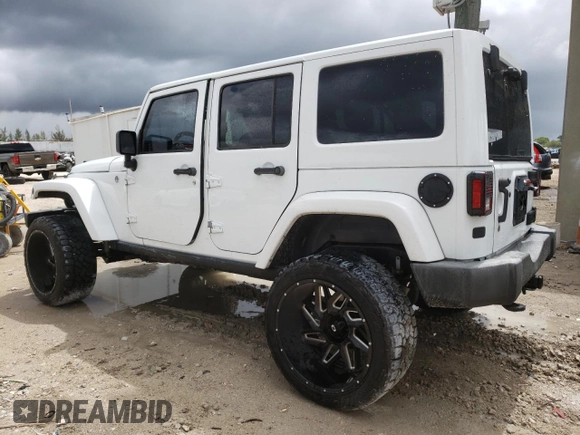 2015 Jeep Wrangler Unlimited Wrangler X with VIN 1C4BJWEG6FL614671, listed as a Copart auction lot 62286095 with 94,928 mi miles and Salvage title. Bid and sale history available at DreamBid. Image 2.