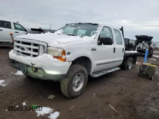 2000 Ford Super Duty F-250 XL with VIN 1FTNW21SXYEB02887, listed as a Copart auction lot 79716124 with 184,020 mi miles and Salvage Title. Bid and sale history available at carsss.com. Image 1.