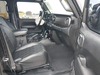 2018 Jeep Wrangler Unlimited Sport S with VIN 1C4HJXDG2JW228483, listed as a IAAI auction lot 41710364 with 56,970 mi miles. Bid and sale history available at carsss.com. Image 5.