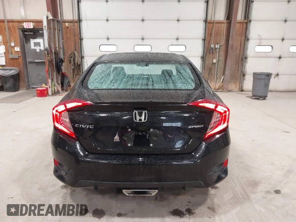 2019 Honda Civic Sport with VIN 2HGFC2F89KH557466, listed as a IAAI auction lot 42335216 with 138,747 mi miles and . Bid and sale history available at DreamBid. Image 16.