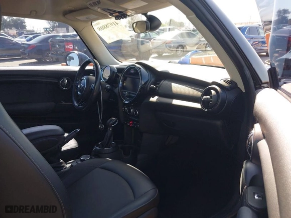 2015 MINI Cooper Hardtop with VIN WMWXM5C51FT941078, listed as a IAAI auction lot 41978808 with 62,682 mi miles. Bid and sale history available at carsss.com. Image 5.