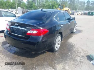2013 Infiniti M with VIN JN1AY1AR6DM590187, listed as a IAAI auction lot 42096806 with 182,909 mi miles and . Bid and sale history available at DreamBid. Image 4.