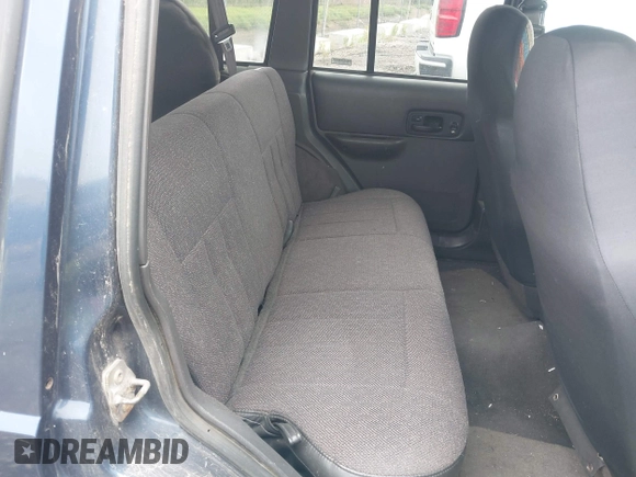 2000 Jeep Cherokee Classic with VIN 1J4FF58S1YL122706, listed as a IAAI auction lot 42560421 with 157,478 mi miles and . Bid and sale history available at DreamBid. Image 8.