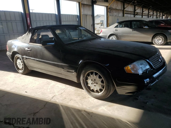 1998 Mercedes-Benz SL-Class with VIN WDBFA67F4WF157443, listed as a Copart auction lot 71600814 with 112,921 mi miles and Clean Title. Bid and sale history available at carsss.com. Image 4.