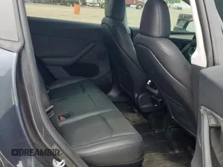 2024 Tesla Model Y Long Range with VIN 7SAYGDEE2RA287446, listed as a Copart auction lot 57640895 with 27,932 mi miles and Salvage title. Bid and sale history available at DreamBid. Image 10.