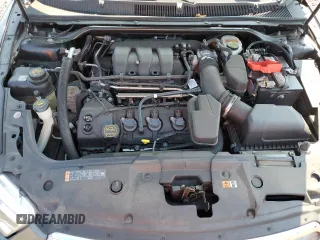 2016 Ford Taurus SEL with VIN 1FAHP2E87GG134004, listed as a Copart auction lot 59764905 with 145,169 mi miles and Salvage title. Bid and sale history available at DreamBid. Image 11.