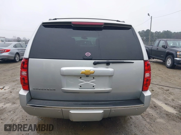 2014 Chevrolet Suburban LTZ with VIN 1GNSCKE05ER173446, listed as a IAAI auction lot 41047096 with 189,049 mi miles and . Bid and sale history available at DreamBid. Image 17.