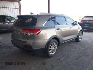2018 Kia Sorento L with VIN 5XYPG4A37JG414012, listed as a IAAI auction lot 41486456 with 165,262 mi miles. Bid and sale history available at carsss.com. Image 4.