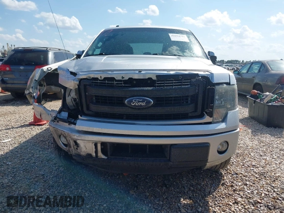 2014 Ford F-150 XL with VIN 1FTFW1CF8EFC43901, listed as a IAAI auction lot 42294761 with 165,289 mi miles and . Bid and sale history available at DreamBid. Image 12.