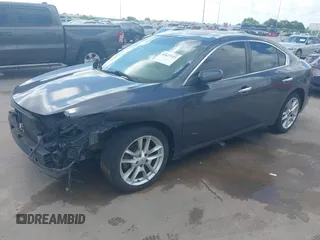 2010 Nissan Maxima SV z VIN 1N4AA5AP5AC820574, wystawiony jako IAAI lot #42427315 z przebiegiem 235 213 mil mil oraz . Historia ofert i sprzedaży dostępna na DreamBid. Obrazek 19.