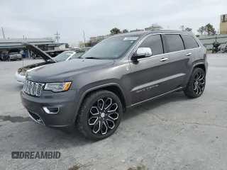 2017 Jeep Grand Cherokee Overland z VIN 1C4RJFCG4HC964479, wystawiony jako Copart lot #50094645 z przebiegiem 100 101 mil mil oraz Szkody całkowita. Historia ofert i sprzedaży dostępna na DreamBid. Obrazek 1.