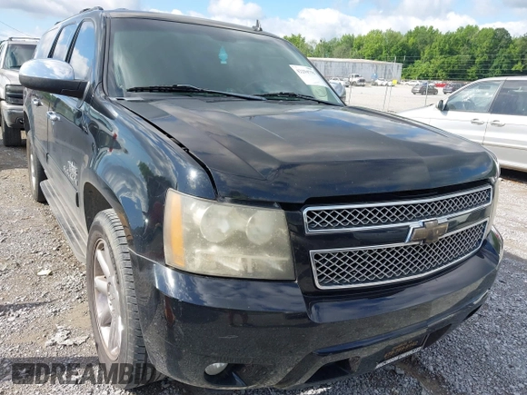 2011 Chevrolet Suburban LT z VIN 1GNSCJE0XBR133465, wystawiony jako IAAI lot #42294755 z przebiegiem 328 824 mil mil oraz . Historia ofert i sprzedaży dostępna na DreamBid. Obrazek 6.