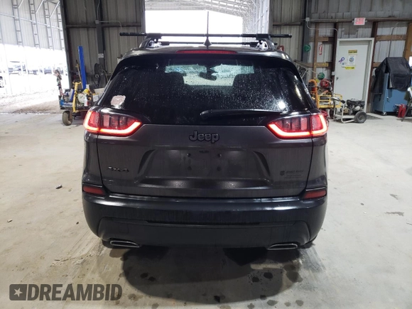 2021 Jeep Cherokee 80th Anniversary with VIN 1C4PJMMX7MD220289, listed as a Copart auction lot 51662175 with 77,109 mi miles and Salvage Title. Bid and sale history available at carsss.com. Image 6.