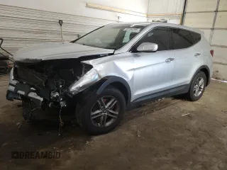 2017 Hyundai Santa Fe 2.4L z VIN 5XYZTDLB3HG496856, wystawiony jako Copart lot #52184295 z przebiegiem 174 486 mil mil oraz Szkoda całkowita • Salvage title. Historia ofert i sprzedaży dostępna na DreamBid. Obrazek 1.