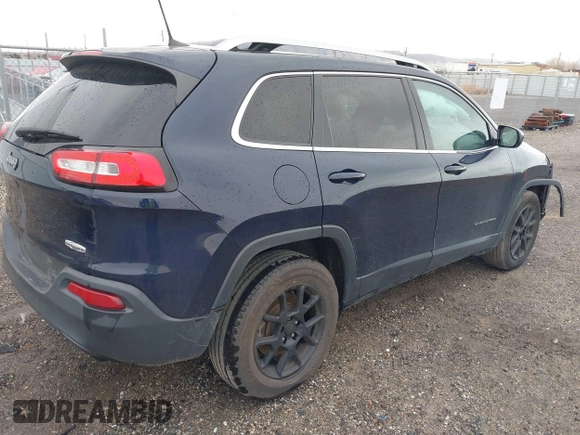 2016 Jeep Cherokee Latitude with VIN 1C4PJMCS1GW255876, listed as a IAAI auction lot 41775711 with 117,519 mi miles. Bid and sale history available at carsss.com. Image 4.