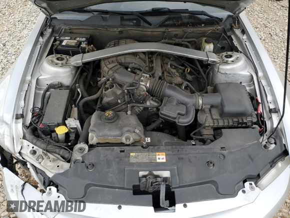 2012 Ford Mustang V6 z VIN 1ZVBP8EM4C5265359, wystawiony jako Copart lot #57124815 z przebiegiem 169 977 mil mil oraz Szkoda całkowita • Salvage title. Historia ofert i sprzedaży dostępna na DreamBid. Obrazek 11.