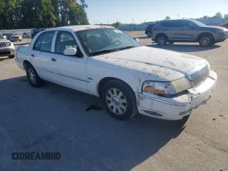 2005 Mercury Grand Marquis LS Premium z VIN 2MEFM75WX5X607647, wystawiony jako Copart lot #73566194 z przebiegiem 206 152 mil mil oraz Szkoda całkowita • Salvage title. Historia ofert i sprzedaży dostępna na DreamBid. Obrazek 4.