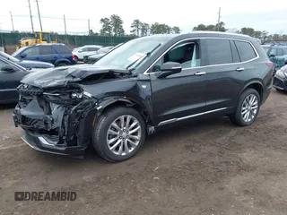 2021 Cadillac XT6 Premium Luxury with VIN 1GYKPCRSXMZ222454, listed as a IAAI auction lot 41648439 with 113,547 mi miles and . Bid and sale history available at carsss.com. Image 18.