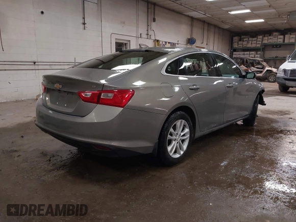 2018 Chevrolet Malibu LT z VIN 1G1ZD5ST0JF185111, wystawiony jako IAAI lot #41910563 z przebiegiem 84 784 mil mil oraz . Historia ofert i sprzedaży dostępna na DreamBid. Obrazek 4.