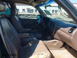 2001 Toyota Sequoia Limited with VIN 5TDBT48A01S048312, listed as a IAAI auction lot 41705751 with 283,397 mi miles. Bid and sale history available at carsss.com. Image 5.