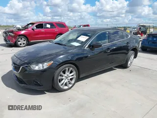 2016 Mazda Mazda6 i Touring with VIN JM1GJ1V53G1430339, listed as a IAAI auction lot 40696335 with 88,433 mi miles. Bid and sale history available at carsss.com. Image 2.