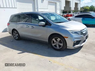 2019 Honda Odyssey EX-L with VIN 5FNRL6H74KB011915, listed as a IAAI auction lot 41898504 with 80,466 mi miles. Bid and sale history available at carsss.com. Image 1.
