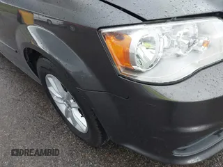 2016 Dodge Grand Caravan SXT with VIN 2C4RDGCG3GR242133, listed as a IAAI auction lot 40412052 with 95,091 mi miles and . Bid and sale history available at DreamBid. Image 17.