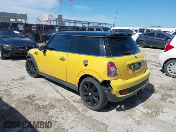 2009 MINI Hardtop S with VIN WMWMF73579TW86675, listed as a IAAI auction lot 42459385 with 129,264 mi miles and . Bid and sale history available at DreamBid. Image 3.