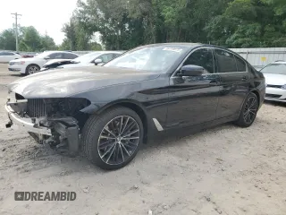 2021 BMW 5 Series 530i xDrive with VIN WBA13BJ02MCF32215, listed as a Copart auction lot 55779575 with 67,983 mi miles and Salvage title. Bid and sale history available at DreamBid. Image 1.