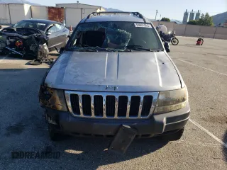 2003 Jeep Grand Cherokee Laredo with VIN 1J4GX48S63C523513, listed as a Copart auction lot 50001005 with 0 mi miles and Salvage Title. Bid and sale history available at carsss.com. Image 5.