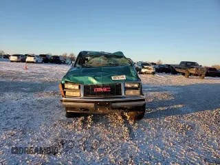 1993 GMC Sierra 1500 z VIN 2GTEK19K8P1562964, wystawiony jako Copart lot #86767744 z przebiegiem 237 615 mil mil oraz Czysty tytuł • Clean title. Historia ofert i sprzedaży dostępna na DreamBid. Obrazek 11.